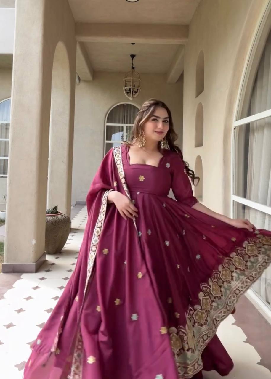 Majestic Wine Flared Anarkali Suit Set Adorned with Delicate Floral Scattered Motifs and an Ornate Heritage Embroidered Border